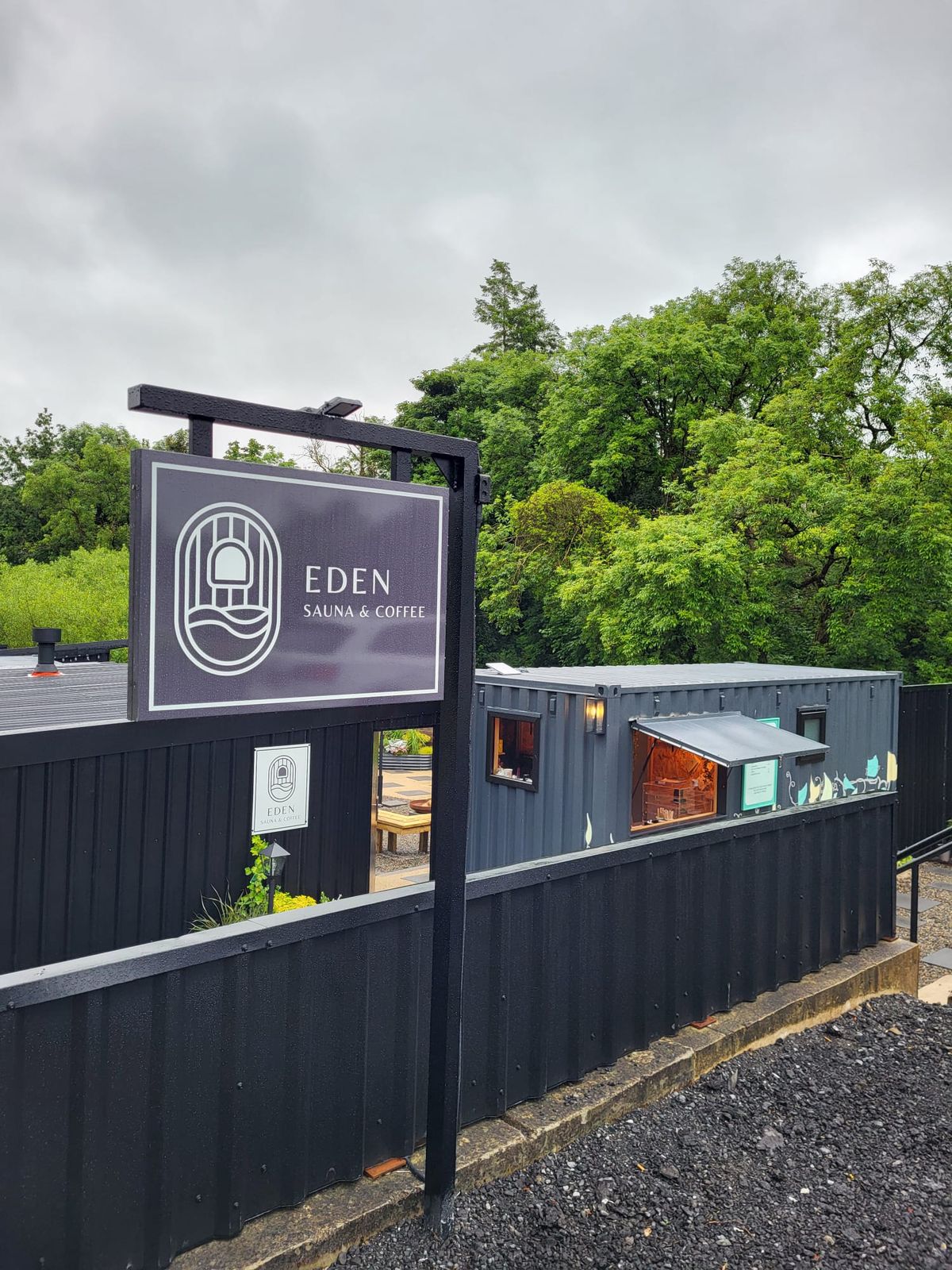 The Eden Sauna & Coffee sign above the coffee hatch