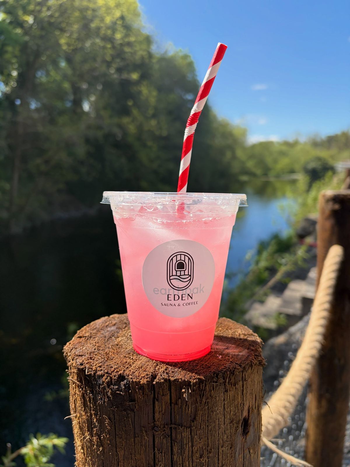 Pink lemonade on a timber post above the River Fane